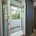 Двухстворчатая балконная дверь с двумя створками 1300*2100 мм